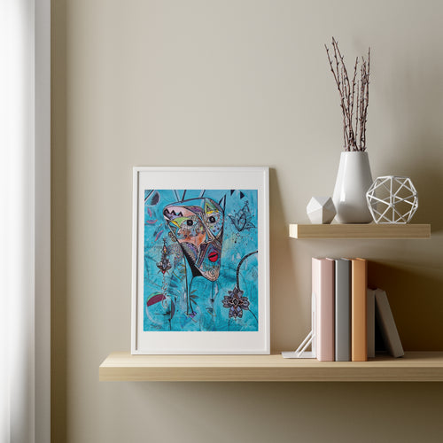 Azul print framed in white on a floating timber shelf against a sage wall, with books and vases