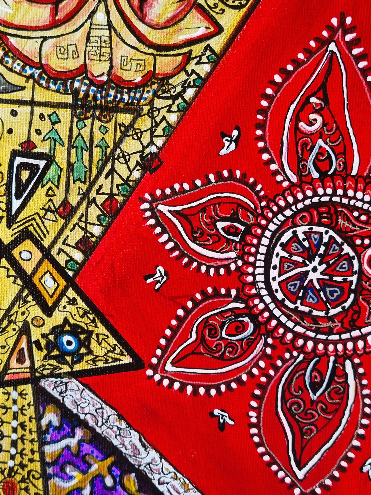 Bishop detail: a red mandala outlined in white above gold triangles of dense hand drawn pattern