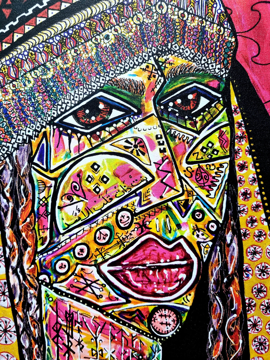 Qadira detail: her face built from facets of colour, steady eyes and bold pink lips under a beaded headdress