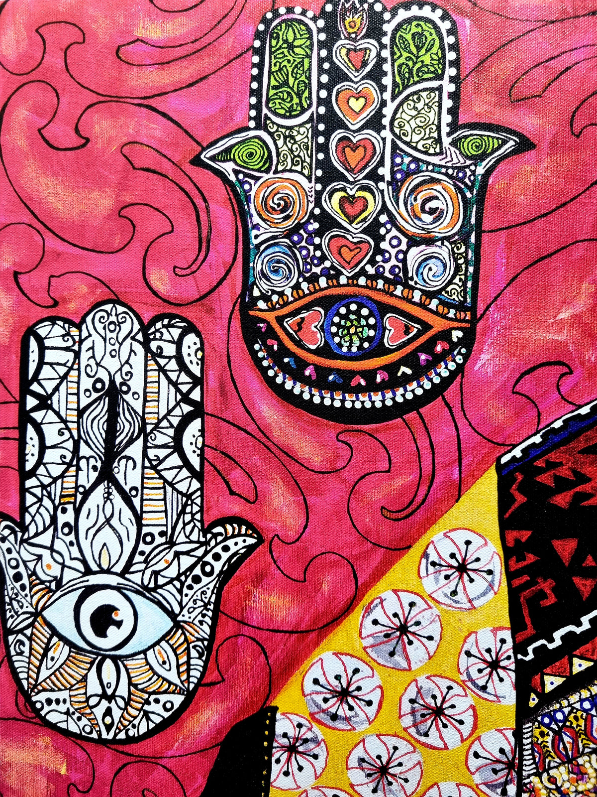 Qadira detail: a hamsa filled with hearts and spirals above a second hamsa inked in black and white