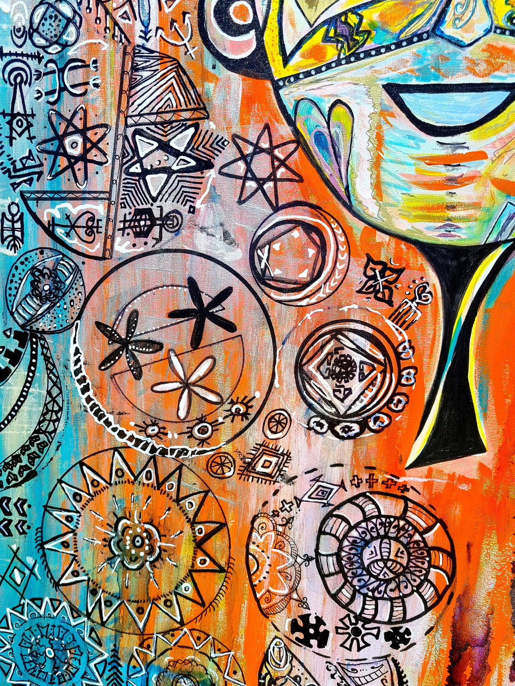 Naranja detail: star flowers ringed in ink beside teal mandalas and the dark line of the neck