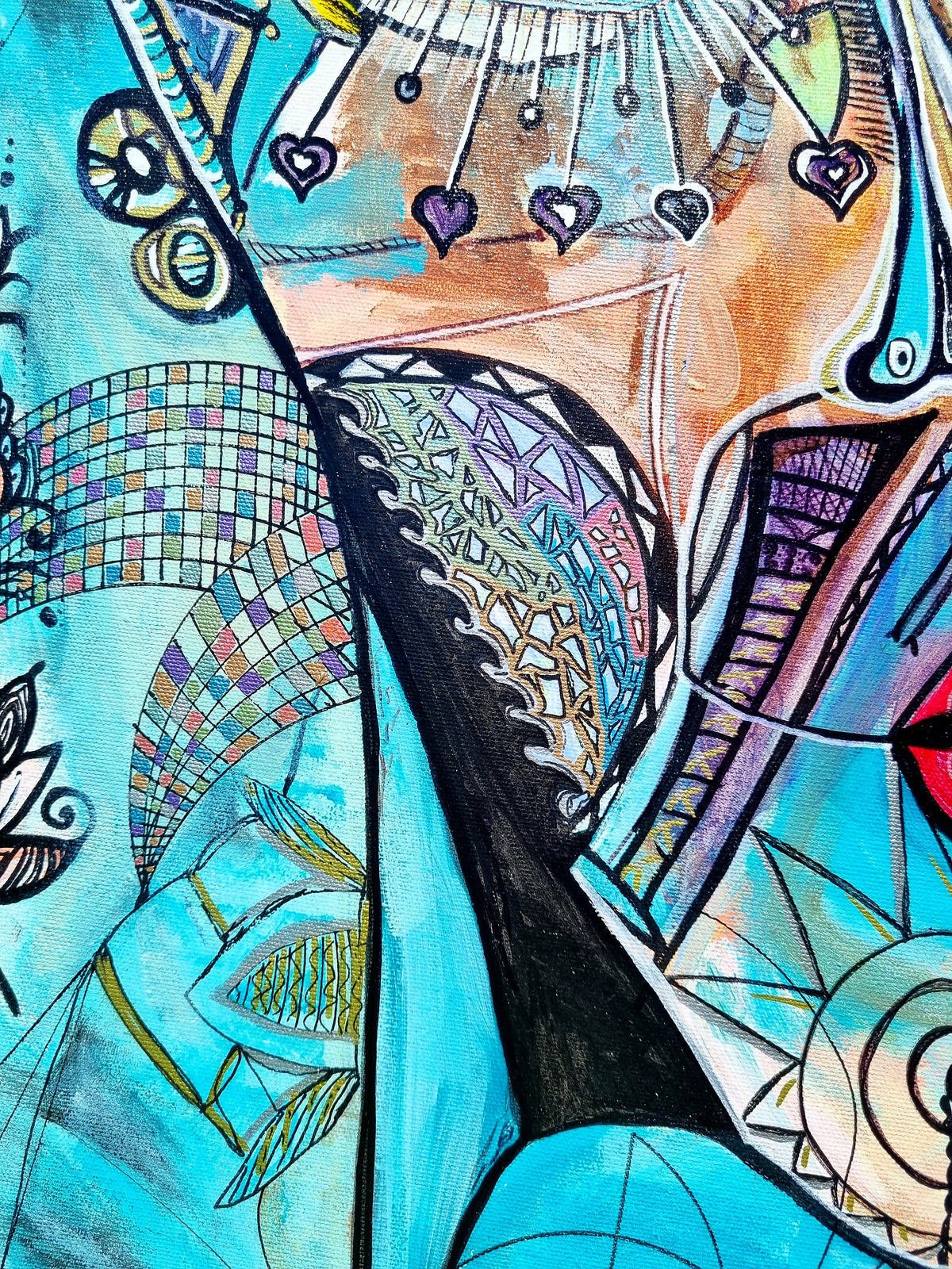 Azul detail: a mosaic arch and a row of small hearts hanging above the sharp black nose