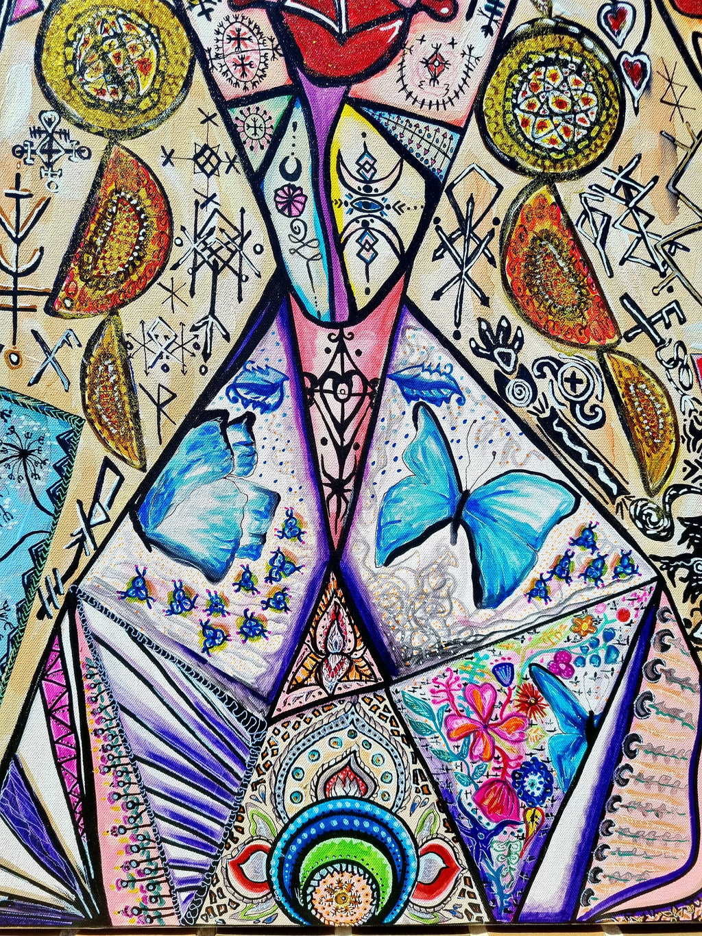 Trinity print detail: two blue butterflies inside a violet triangle above a beaded fan