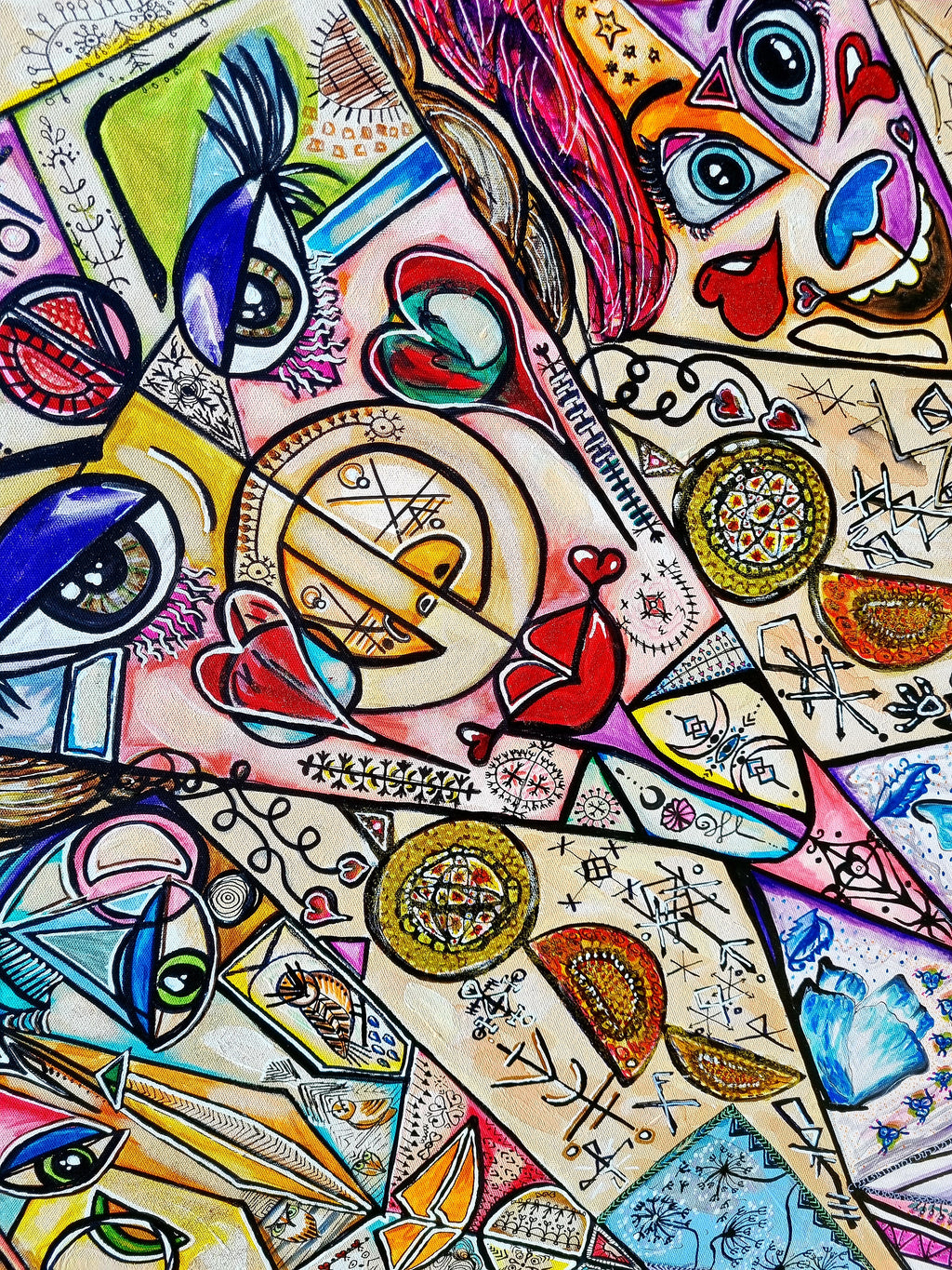 Trinity detail: the centre sister's sun disc, with a small red bird and hearts alongside