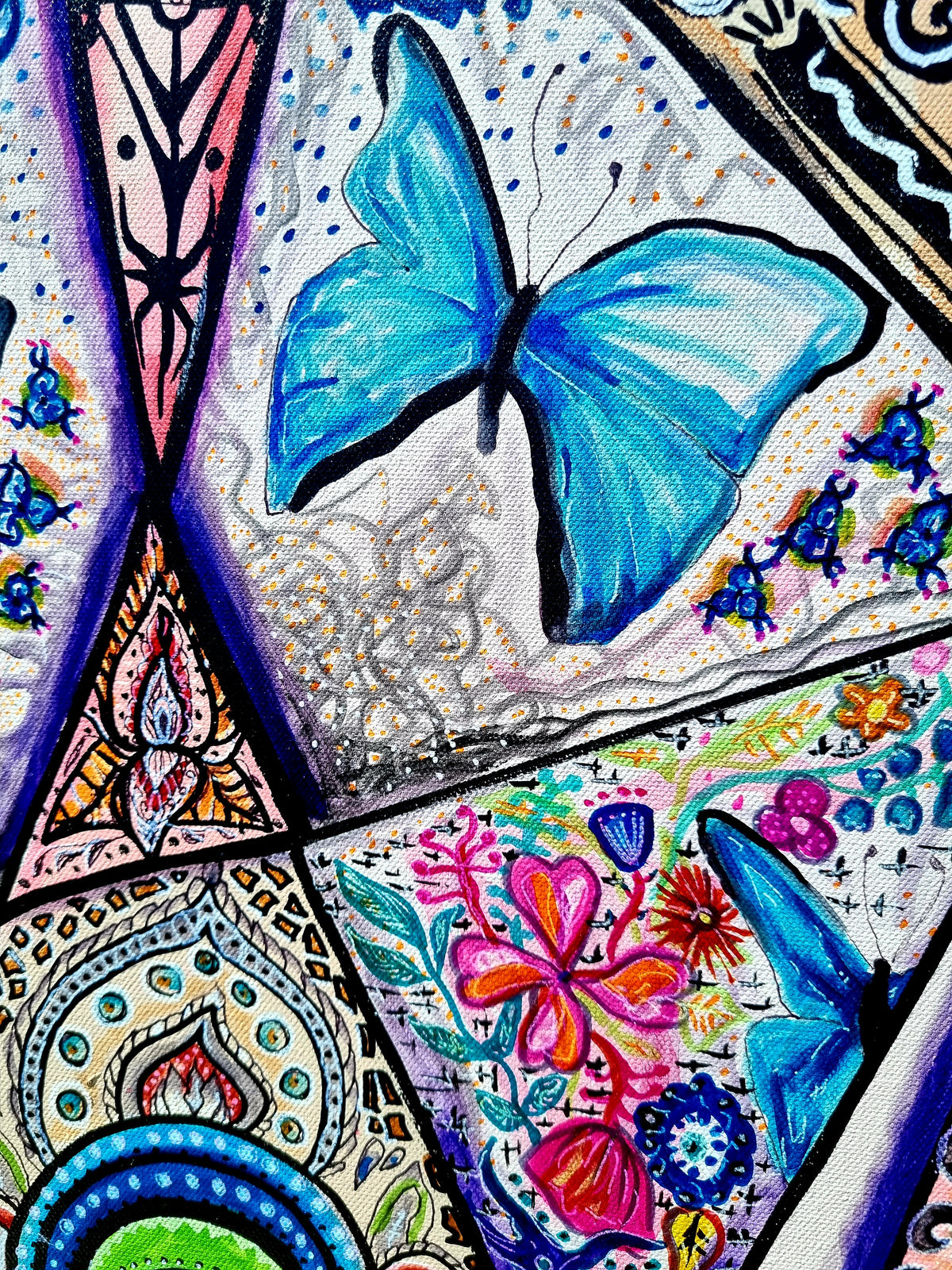 Trinity detail: a blue butterfly resting among painted flowers and fine hand drawn pattern