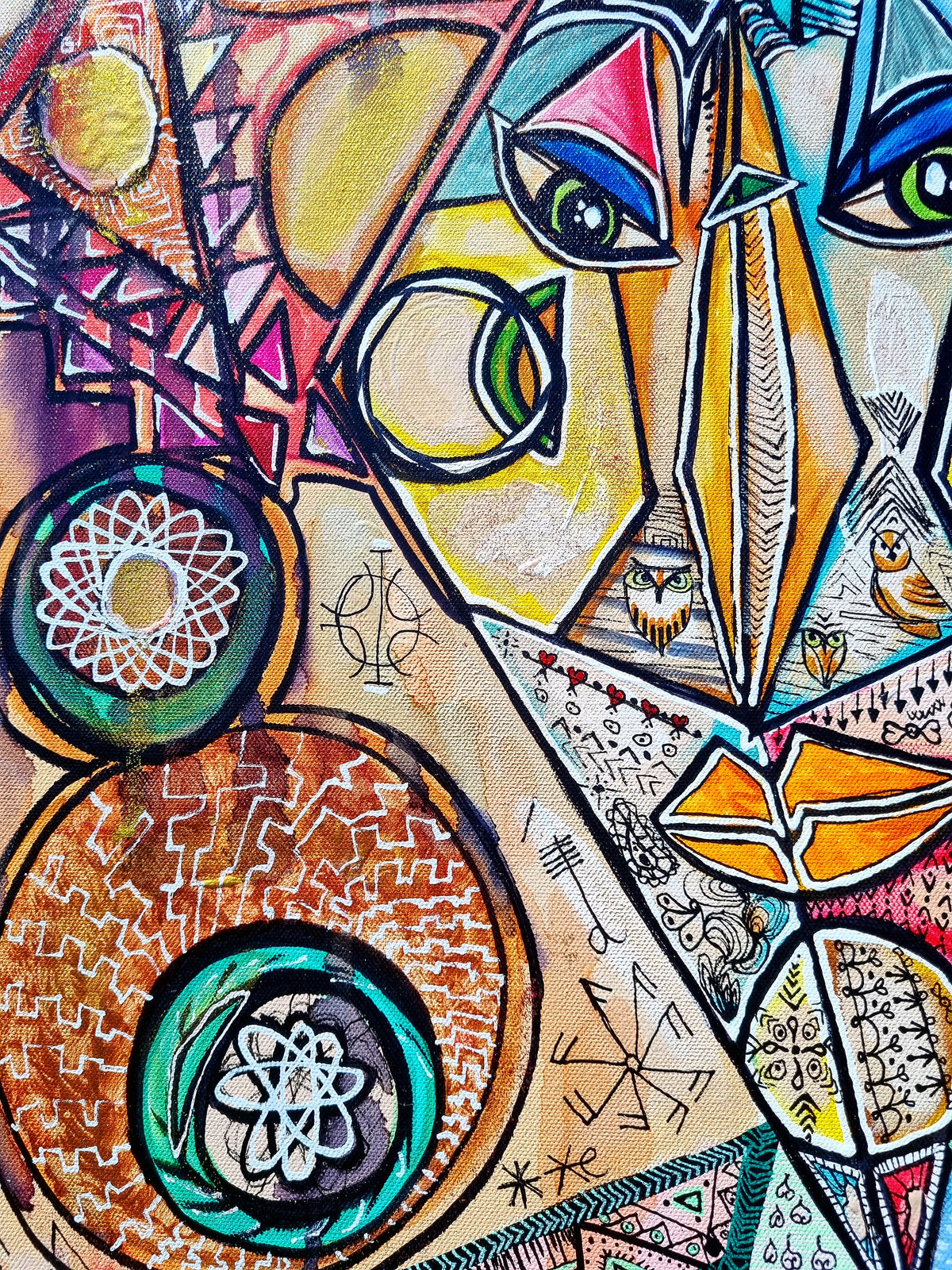 Trinity detail: a copper coloured disc and pale triangles edged in black outline