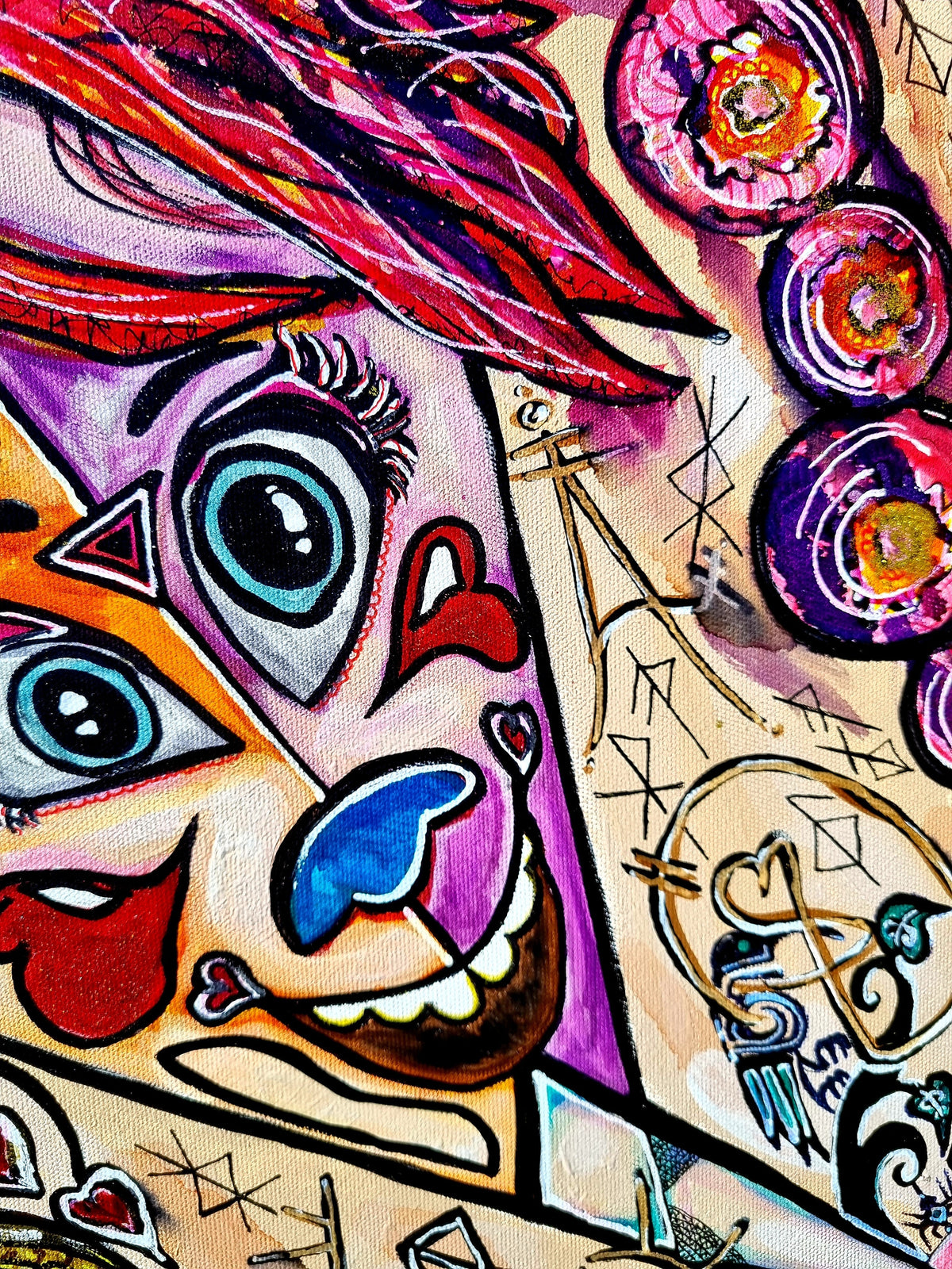 Trinity print detail: a face with flame red hair, wide blue eyes and a grinning red mouth
