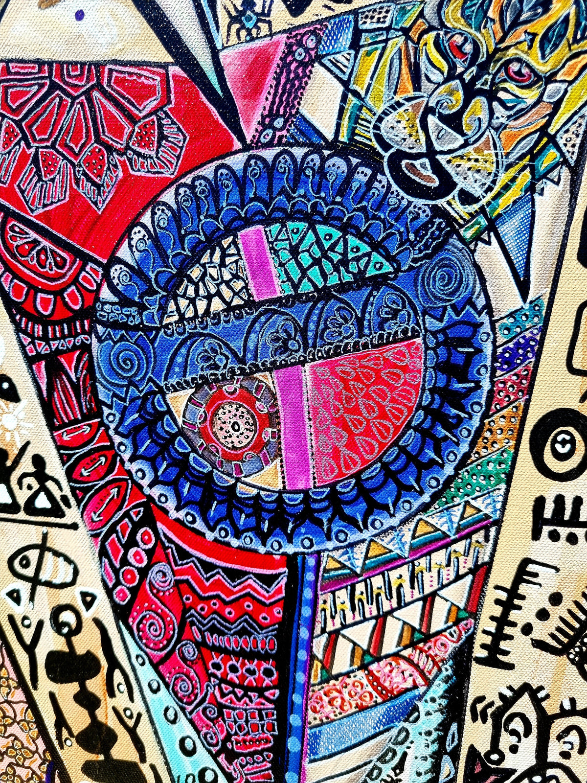 Trinity print detail: a large blue and red wheel ringed with beading and fine ink marks