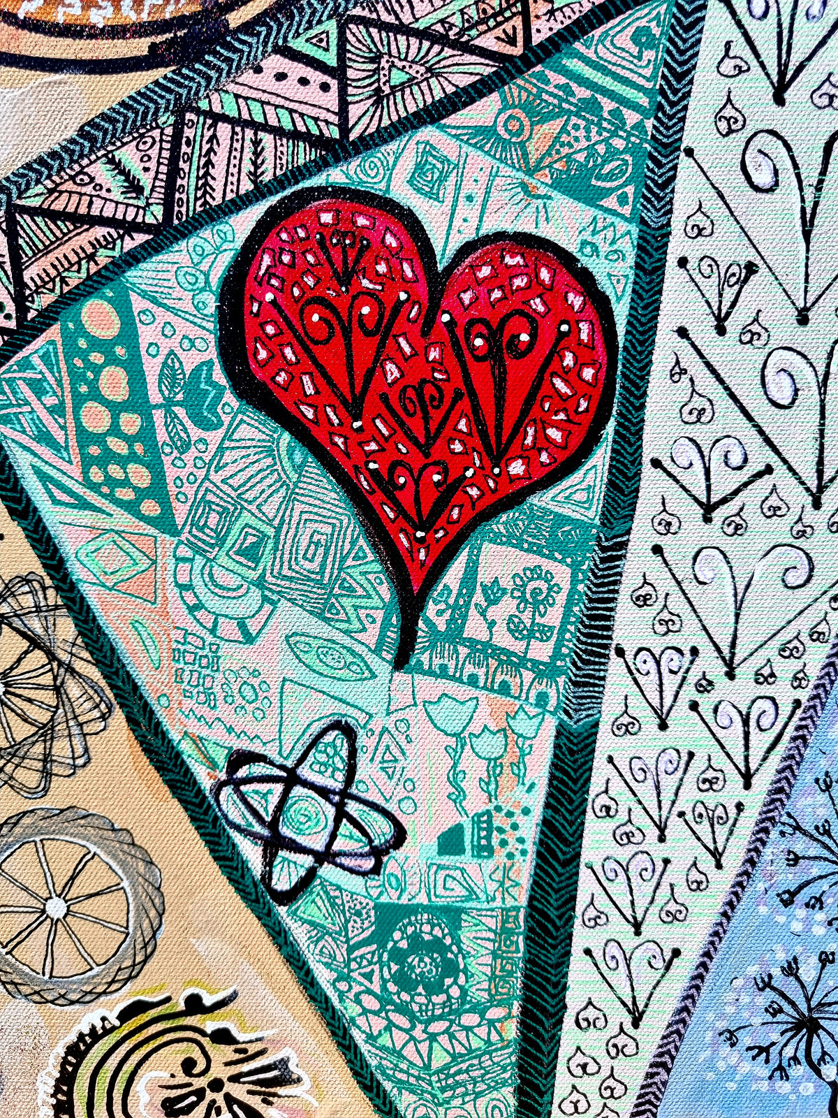 Trinity detail: a red heart set into turquoise panels of intricate hand drawn line work