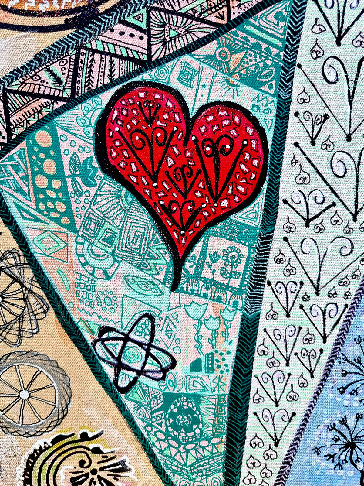 Trinity print detail: a red heart patterned with tiny loops, set on a teal inked panel