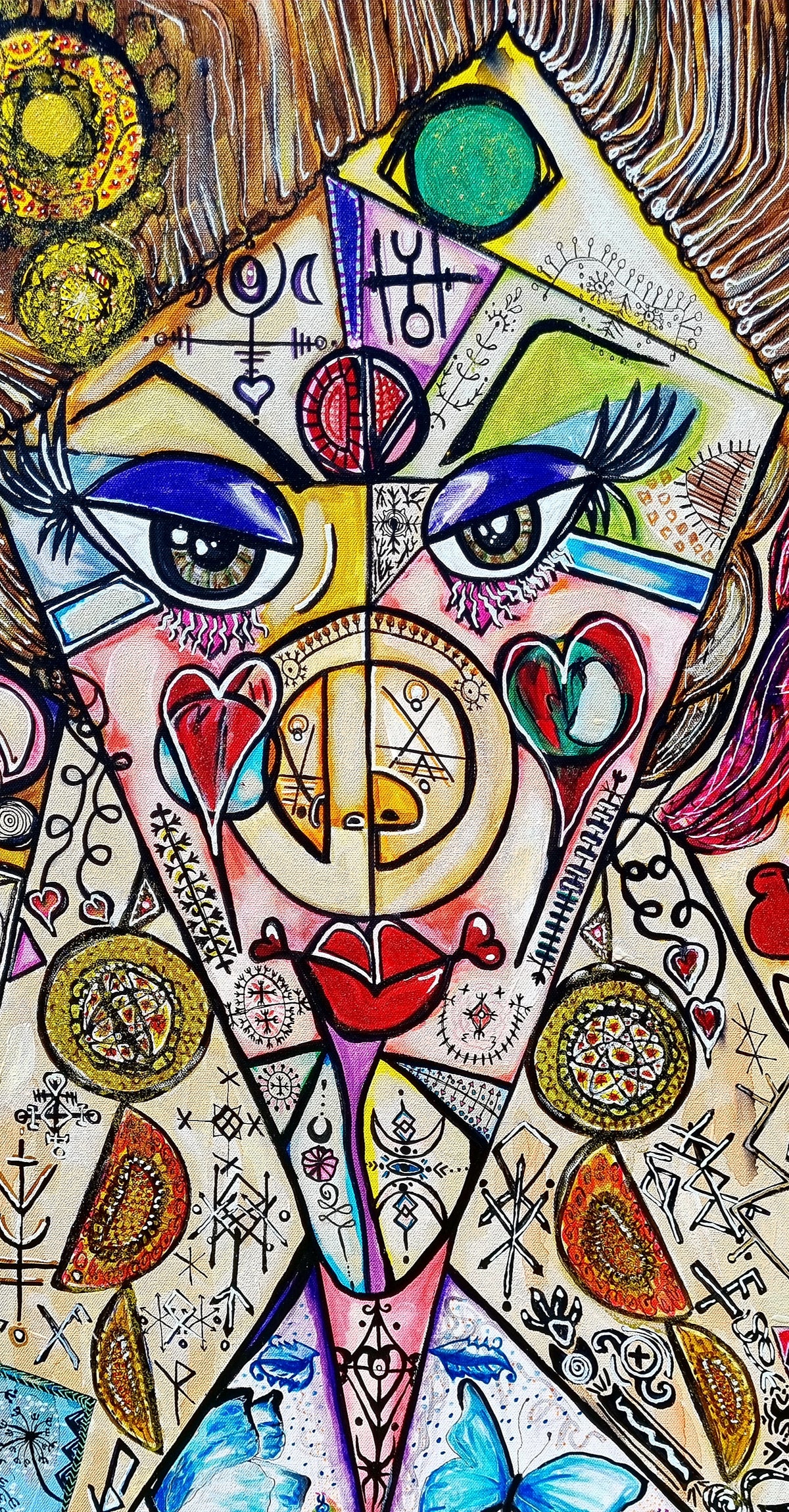 Trinity detail: the central sister's face, a sun disc at her third eye and hearts at her cheeks