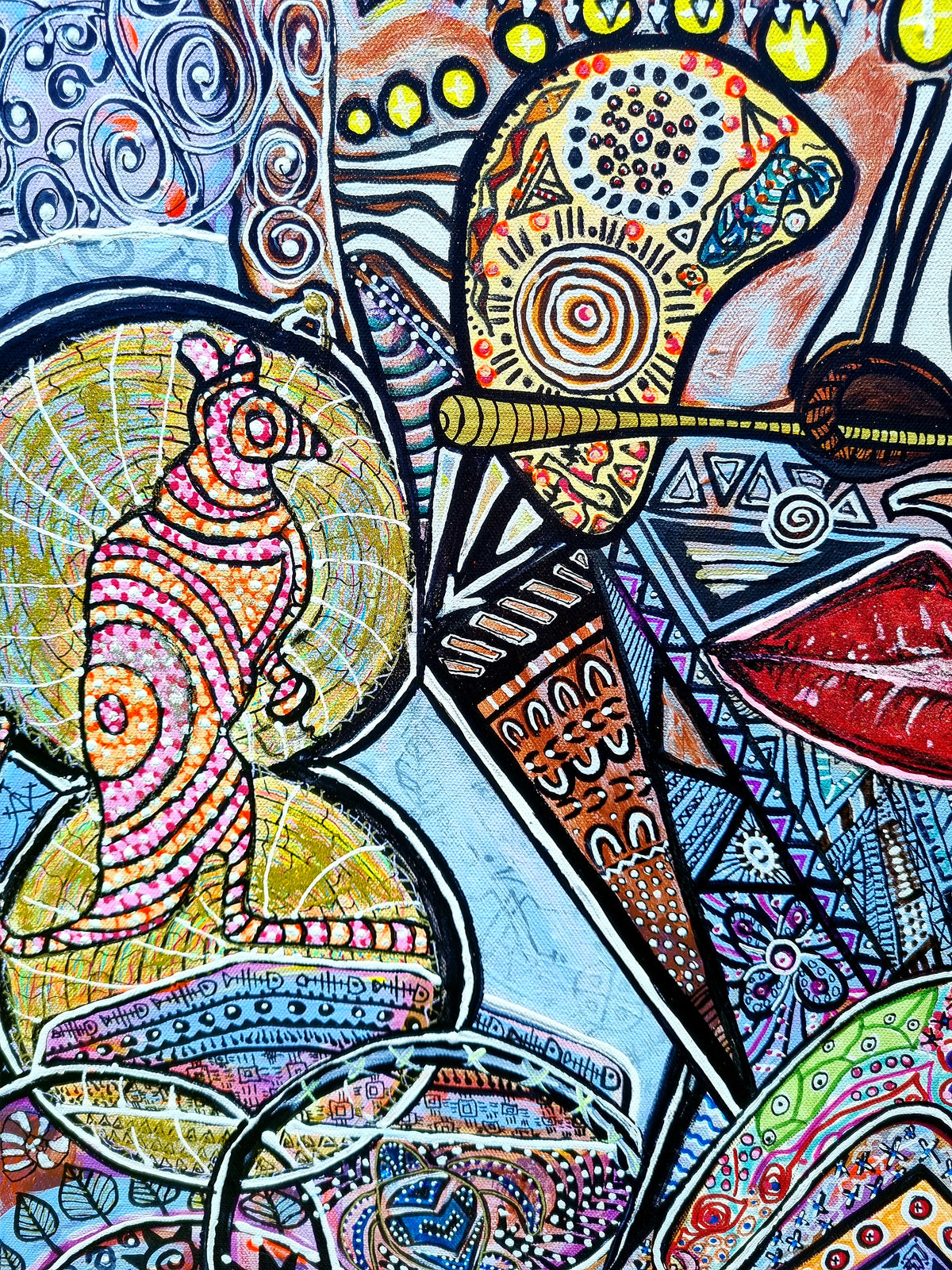 Wiana detail: a pink and gold bird perched on a stem, with the figure's red lip at the edge
