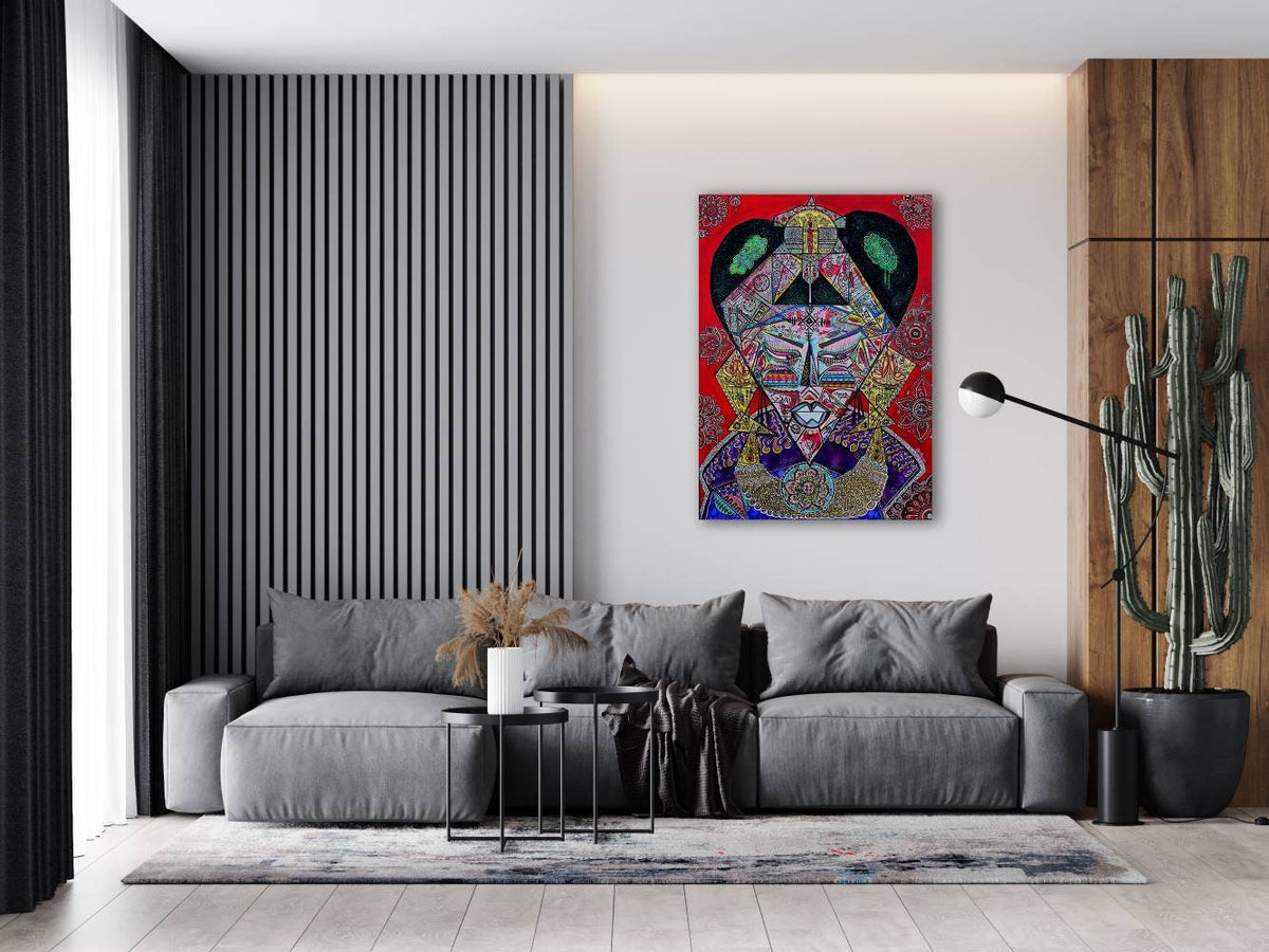 Bishop on a white wall in a living room above a long grey sofa with a low black coffee table