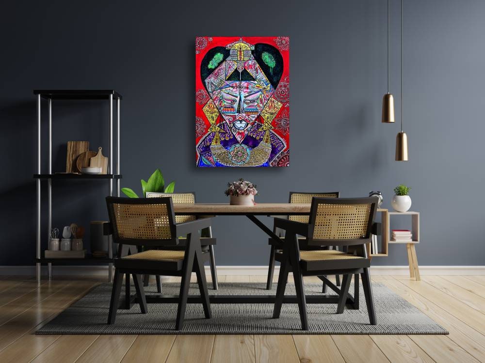 Bishop hanging on a dark grey wall above a wooden dining table with black chairs and pendant lights