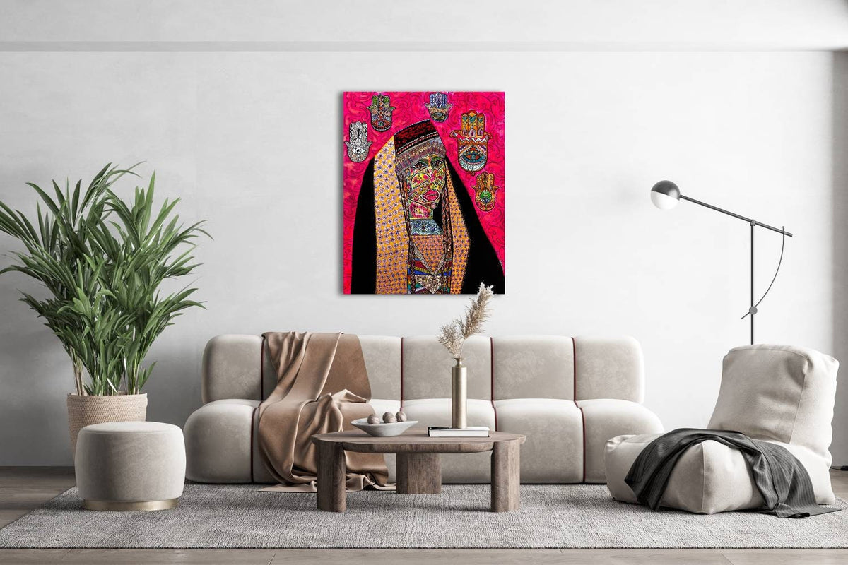 Qadira on a white wall above a cream sofa, beside a potted plant and an arc floor lamp