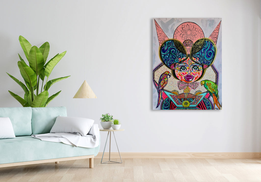 Kitty Kat on a white wall in a bright room with a pale mint sofa and a leafy plant